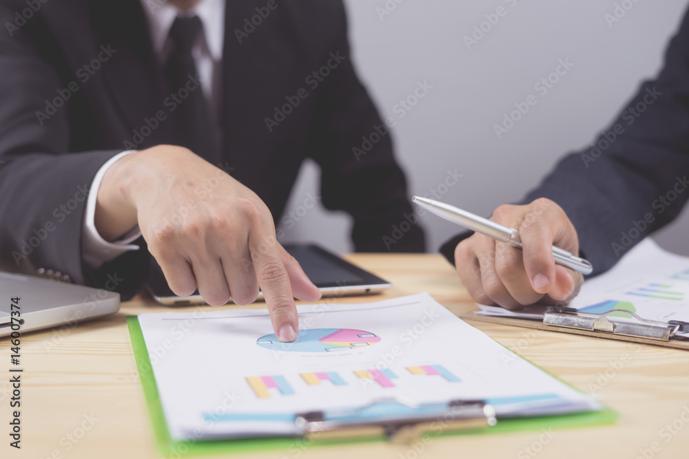 Teamwork concept,operate with collaborative cooperation or participation,Businessman team analyzing income charts and graphs with modern laptop computer.Business analysis and strategy concept. Teamwork concept,operate with collaborative cooperation or participation,Businessman team analyzing income charts and graphs with modern laptop computer.Business analysis and strategy concept.