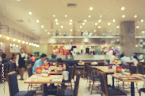Defocus image of Coffee Shop or Cafeteria ,Customer at restaurant blur with bokeh for use as Background,vintage retro color © Have a nice day 