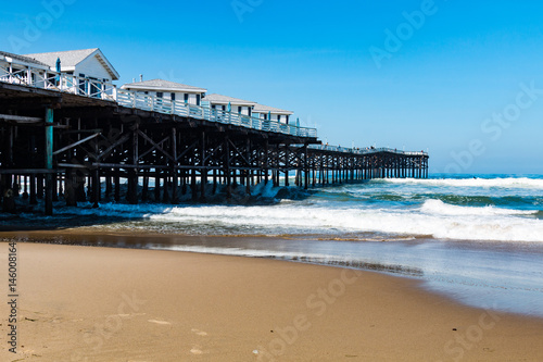 Pacific Beach in San Diego  California with vacation cottages on top of Crystal Pier.