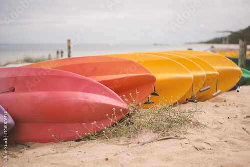 Kayaks on the beach during the day