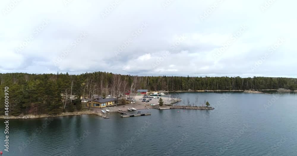 SKALDO, UUSIMAA, FINLAND, APRIL 11 Cinema 4k aerial flight towards baggö, in the finnish archipelago at Skaldo, just outside tammisaari national park, in Finland SKALDO, UUSIMAA, FINLAND, APRIL 11 Cinema 4k aerial flight towards baggö, in the finnish archipelago at Skaldo, just outside tammisaari national park, in Finland