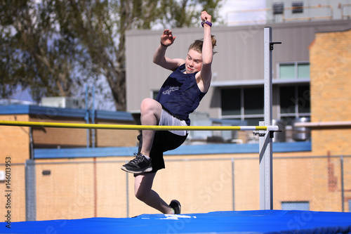 female athlete attempting high jump