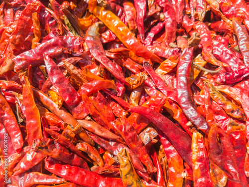 Red peppers dried in the sun for food.