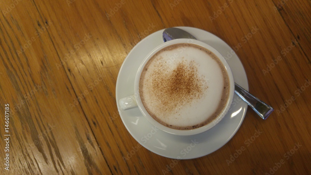 A glass of hot cocoa in the cafe. A glass of hot cocoa in the cafe.