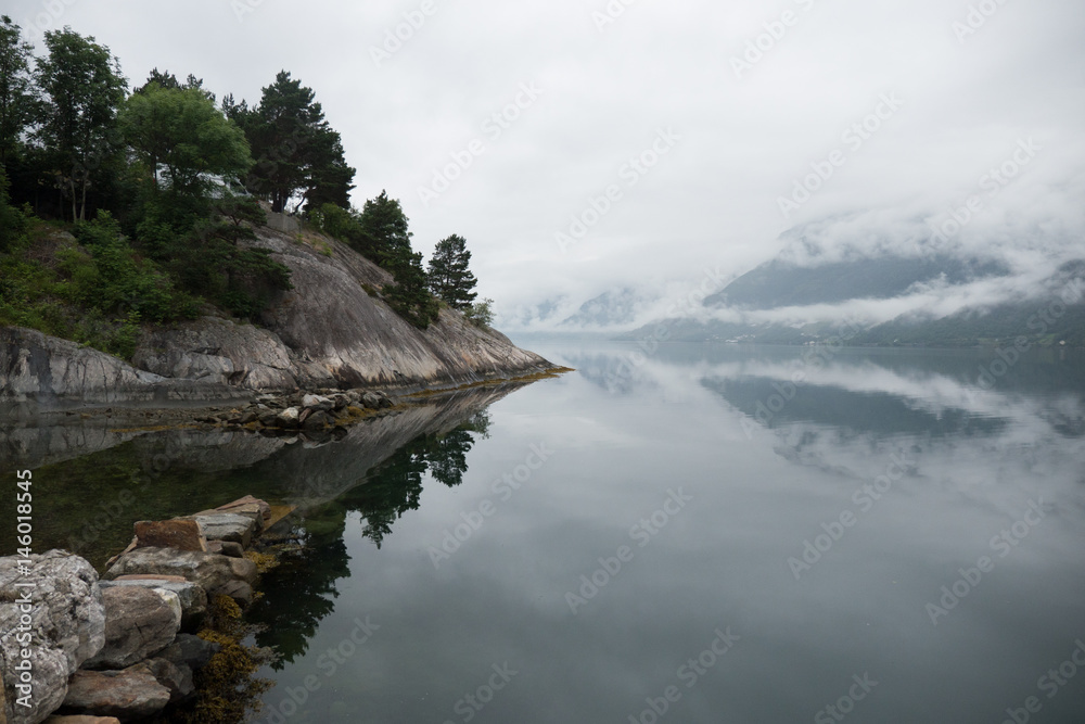 Norway - ideal fjord reflection in clear water