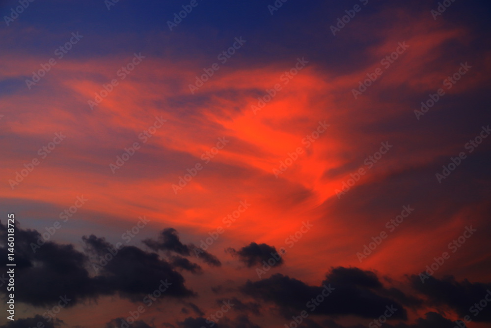 dramatic sunset and sunrise  the beautiful red cloud in   a sky
