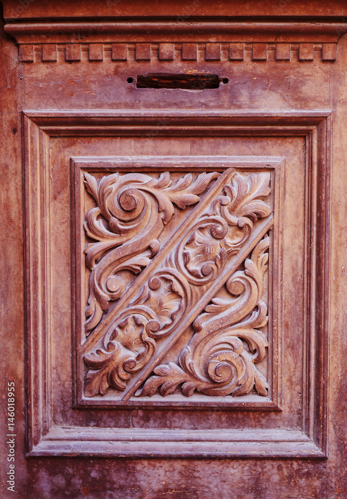 Detail part of decorative old wooden door with ornament in Tbilisi, Georgia