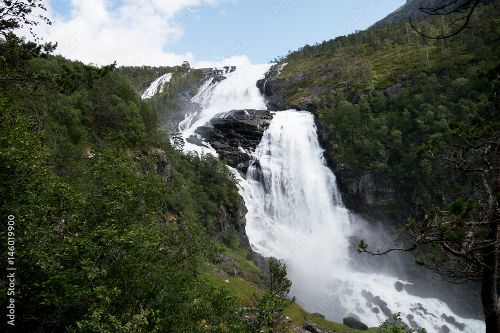 Waterfall in mountains of Norway in rainy weather. Waterfall in mountains of Norway in rainy weather.