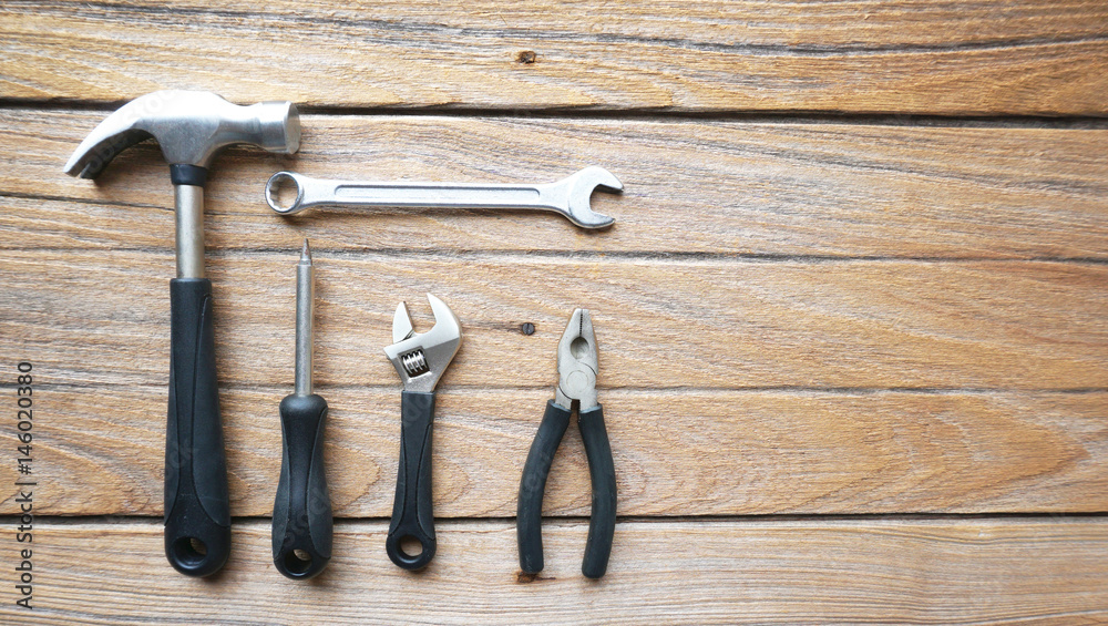 tools on wood background tools on wood background