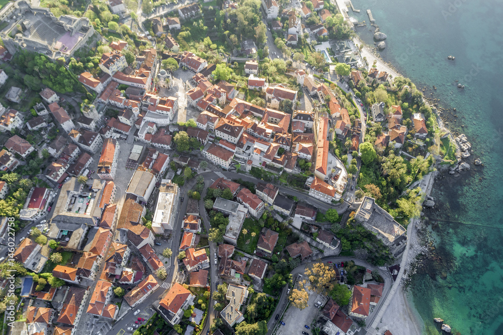Fototapeta premium Top view of a beautiful city near the sea