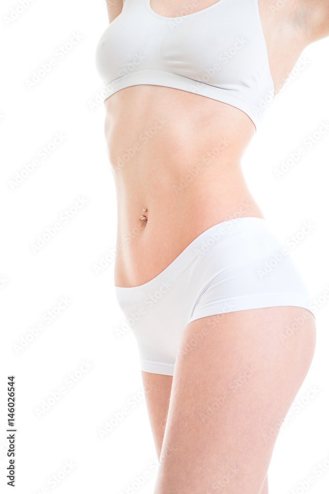Beautiful slim female body in underwear, isolated on white background