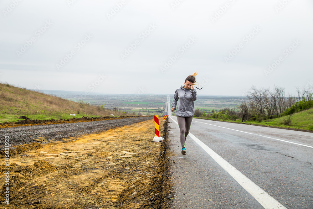 the girl in sportswear on the road the girl in sportswear on the road