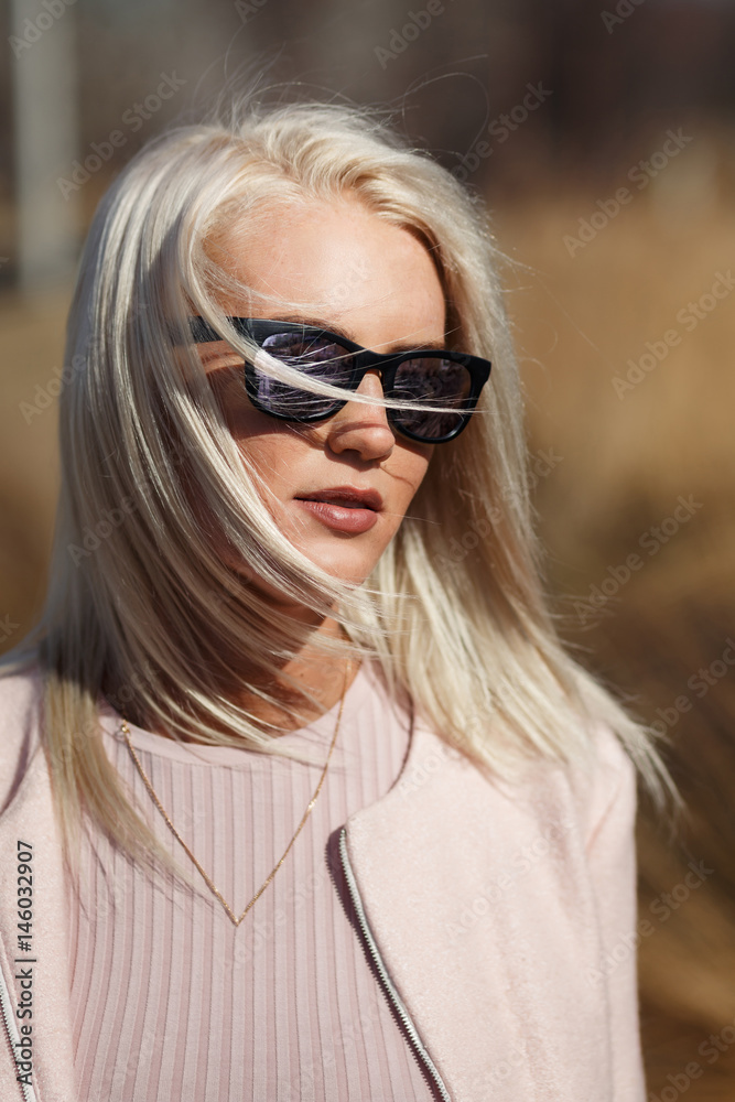Portrait of blonde in sunglasses Portrait of blonde in sunglasses