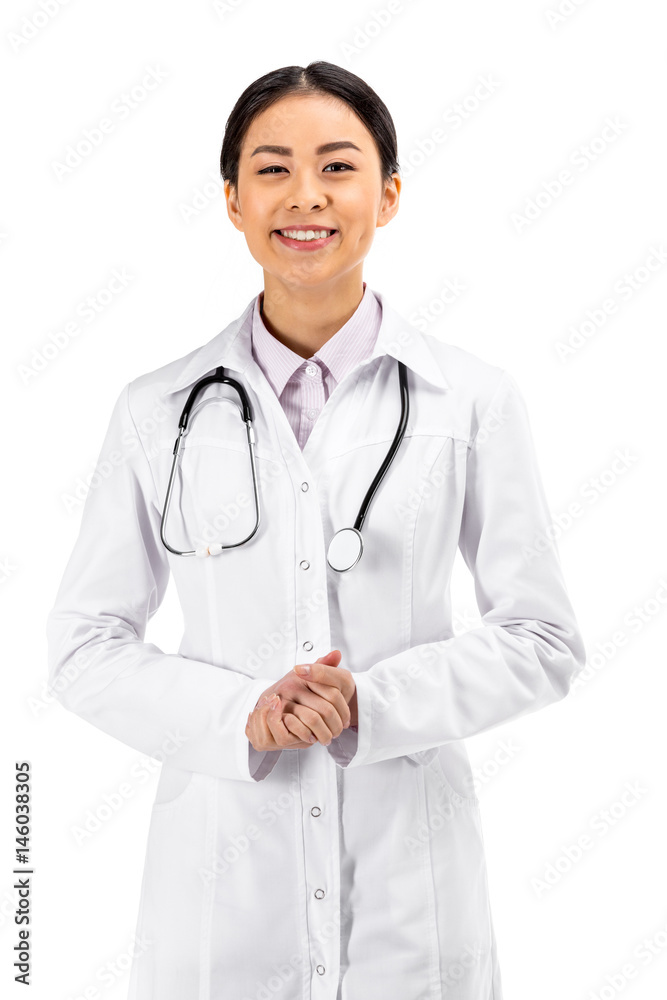 asian female doctor standing with stethoscope in white coat isolated on white asian female doctor standing with stethoscope in white coat isolated on white