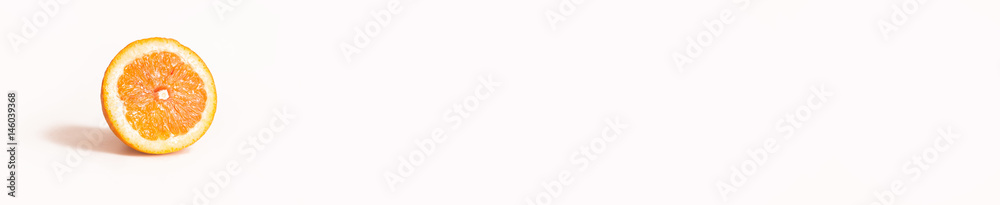 Bright and Fresh Single Orange slice in a Panoramic Image For Skinali. Bright and Fresh Single Orange slice in a Panoramic Image For Skinali.