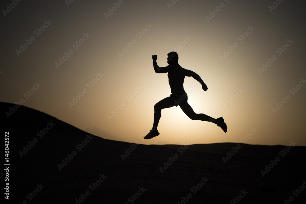 running man on mountain nature landscape on sky background