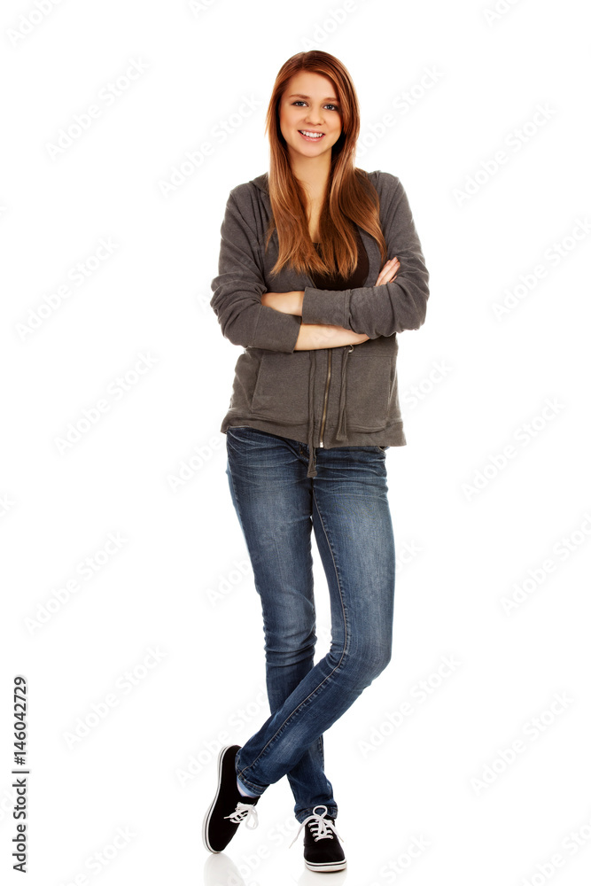 Happy teen woman with folded arms Happy teen woman with folded arms