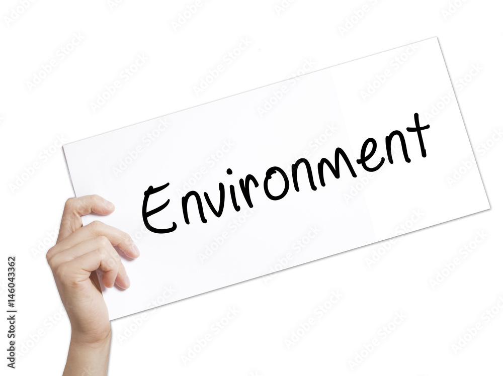 Environment Sign on white paper. Man Hand Holding Paper with text. Isolated on white background Environment Sign on white paper. Man Hand Holding Paper with text. Isolated on white background