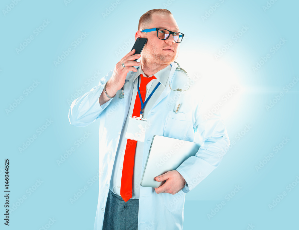 Portrait of young handsome happy male doctor. Portrait of young handsome happy male doctor.