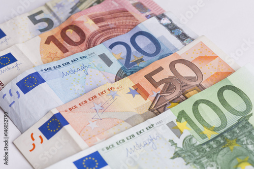 used Euro banknotes lined up