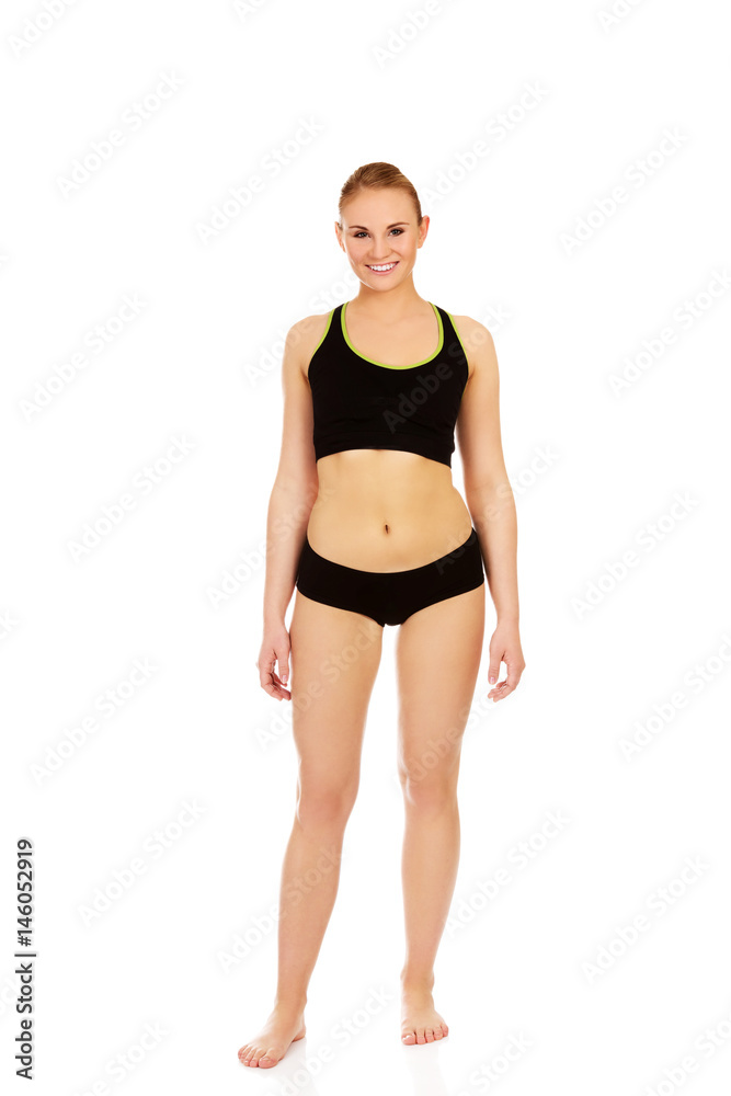 Athletic young woman in sports underwear