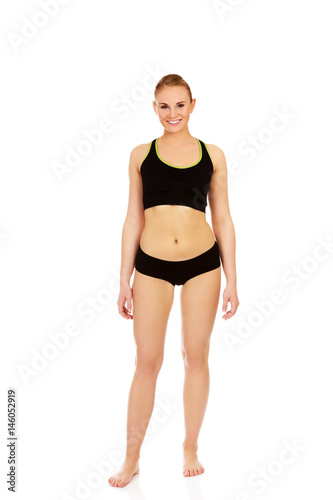 Athletic young woman in sports underwear