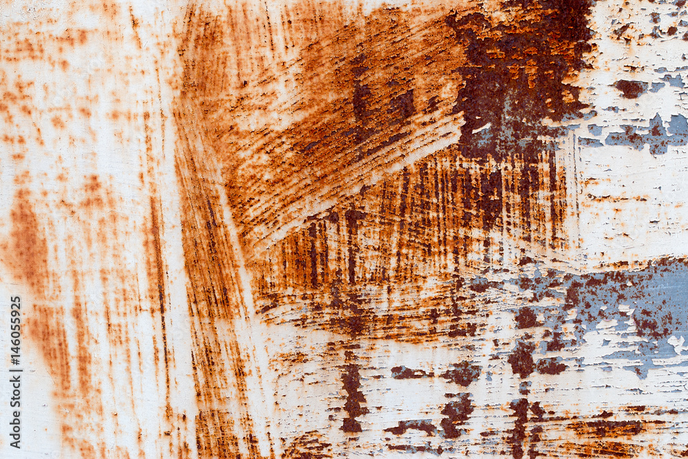 Fototapeta premium A background of peeling paint and rusty old metal