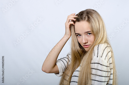 beautiful girl in striped sweater