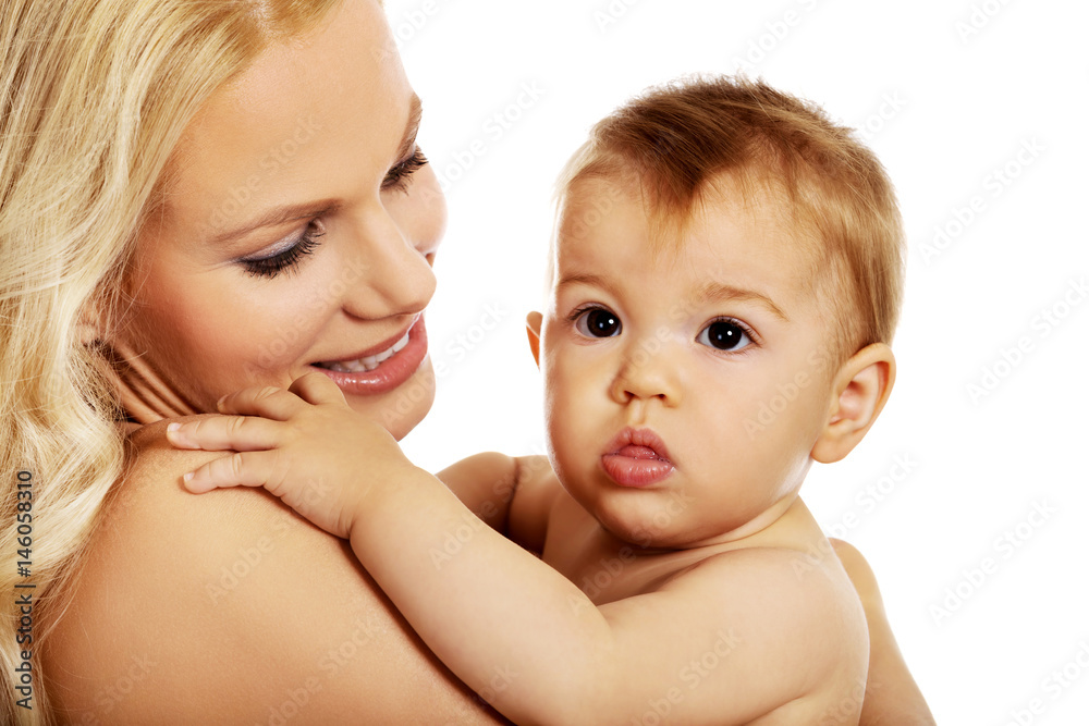 Young mother with her adorable baby Young mother with her adorable baby