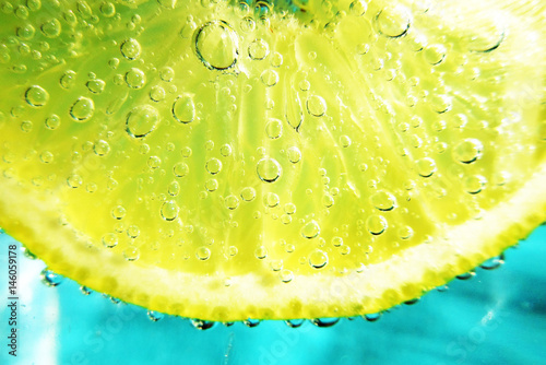 Slice of lemon in sparkling water