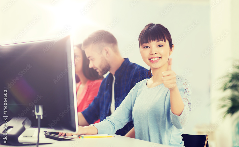 happy creative team or students working at office happy creative team or students working at office