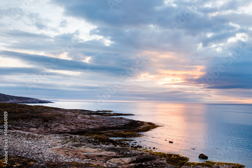 Teriberka, Kola Peninsula, Russia. Sunset on the Barents Sea, Arctic Ocean.