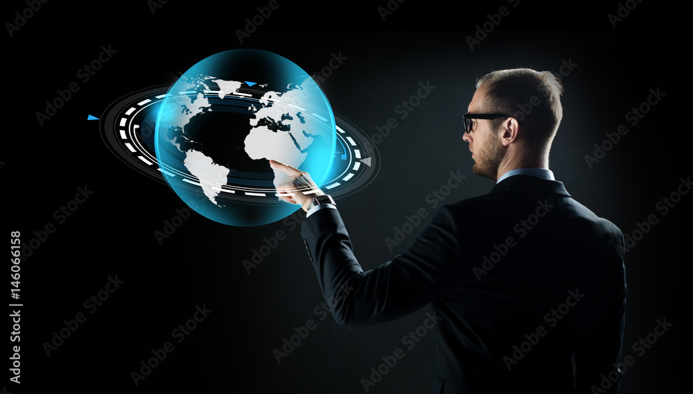businessman with virtual earth projection businessman with virtual earth projection