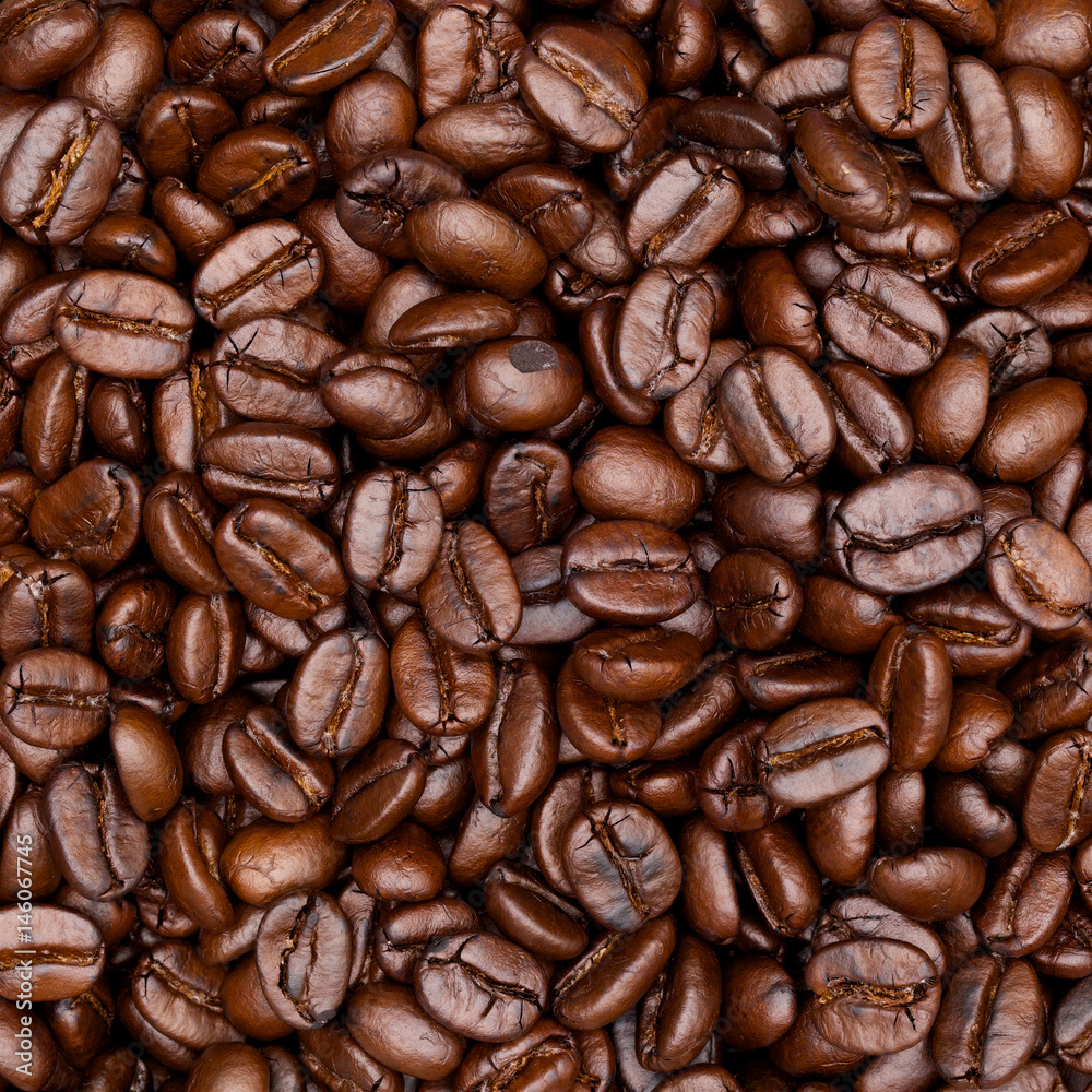 Fototapeta premium close up shot of roast coffee texture background in square ratio
