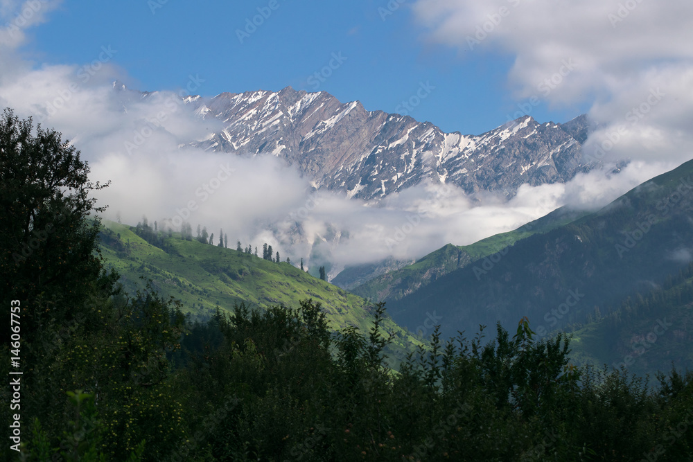 Beautiful snow capped mountains view around old manali