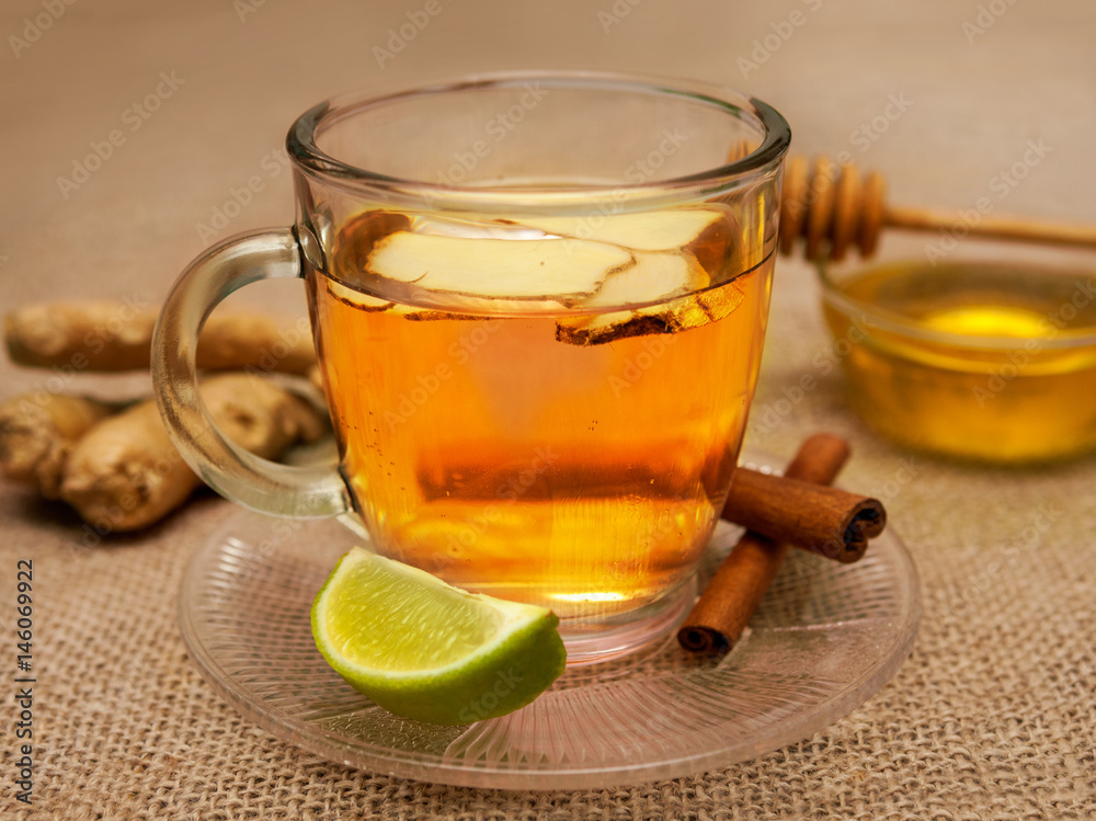 Close shot of ginger tea in a glass Close shot of ginger tea in a glass