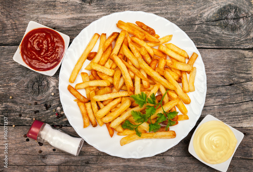 Top view on a plate with french fries