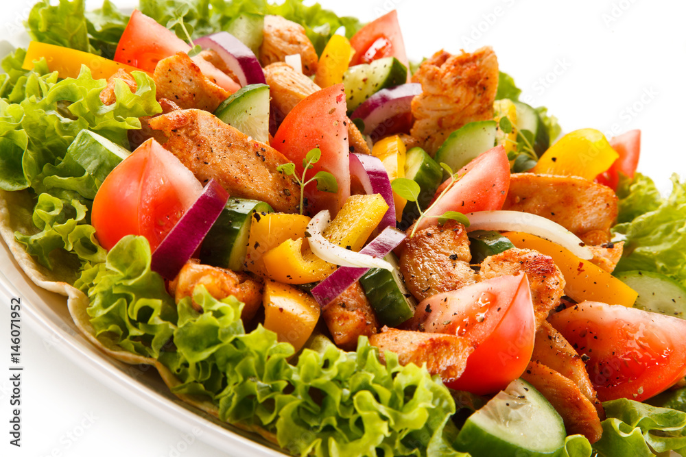 Grilled chicken strips with vegetable salad