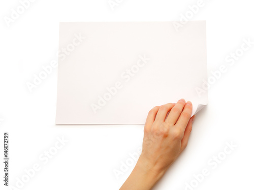 Woman's hand turning over paper