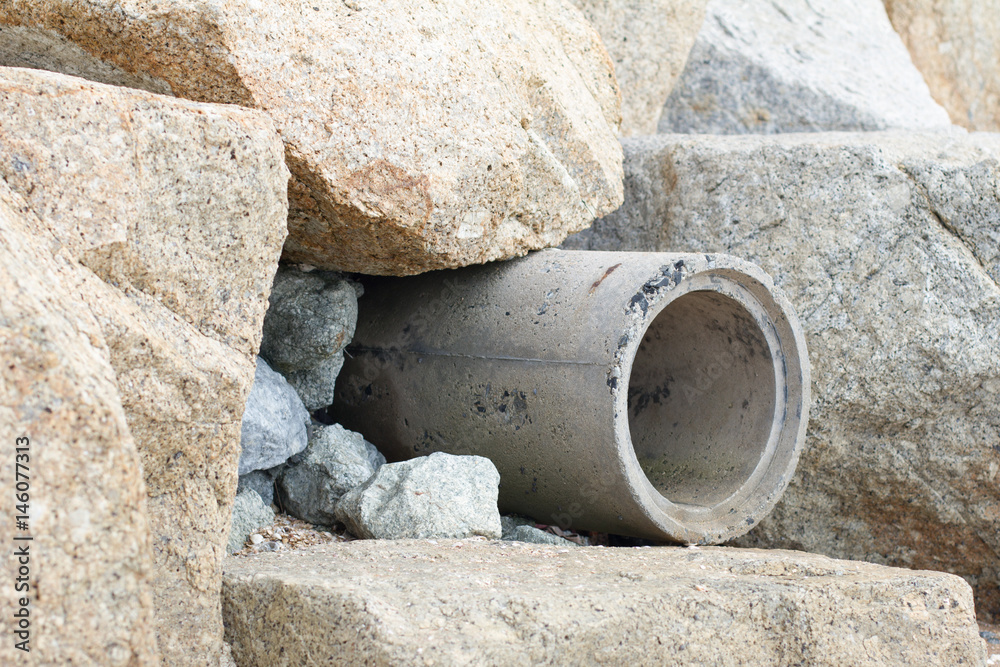 Trench mortar with stone on the beach background Trench mortar with stone on the beach background