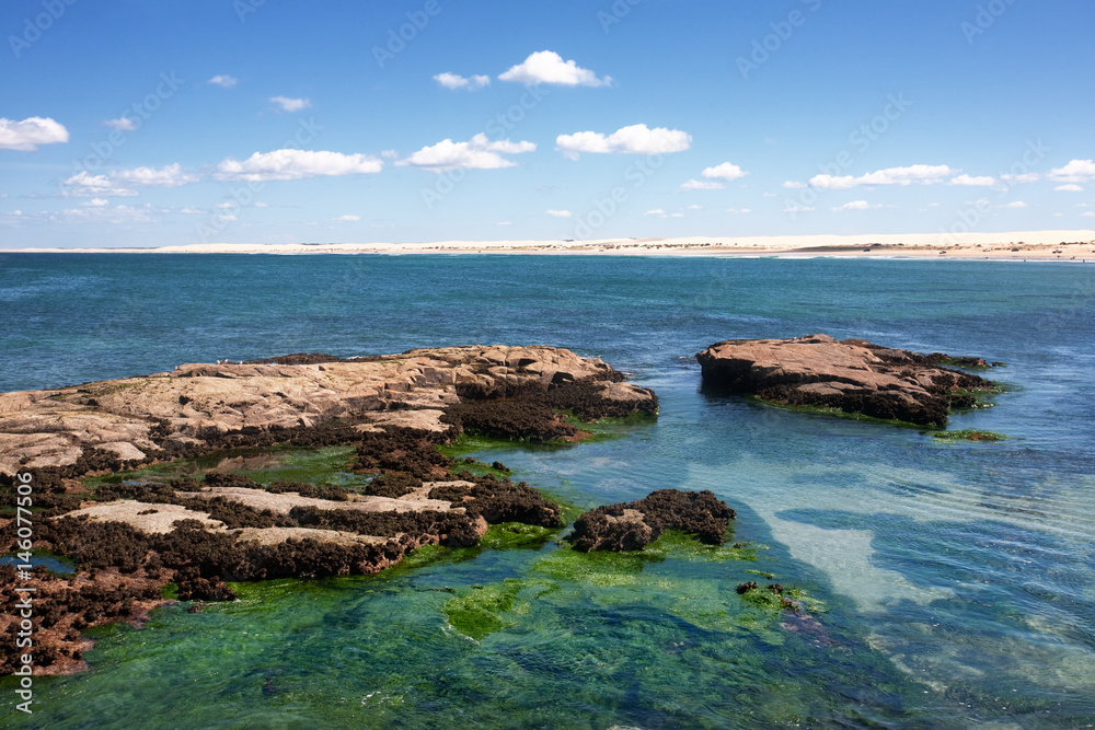 Rocks at Birubi Beach, part of the 34 kilometre stretch of Stockton Bight at Anna Bay, the longest coastal sand dunes in Australia.