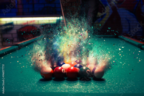 Billiard balls break up into particles and fracture when broken photo