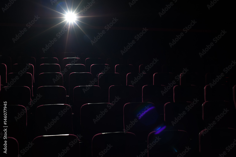 Movie theater background, red seats in cinema hall