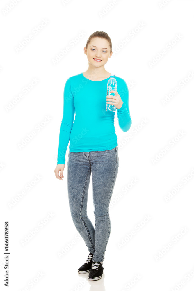 Fototapeta premium Beautiful woman with bottle of mineral water.