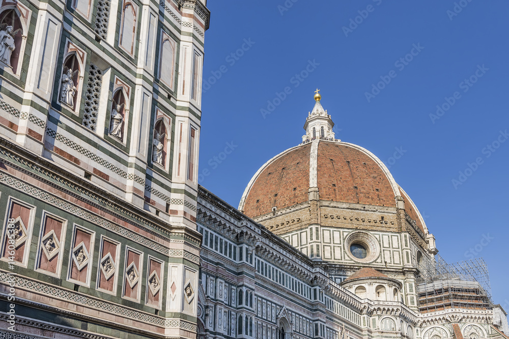 Beautiful detail from below of the Duomo in Florence, Italy, on a sunny day