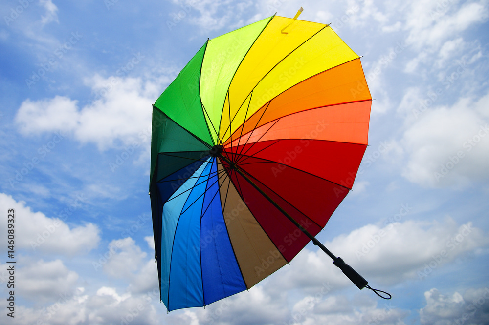 colourful umbrella and bright blue sky