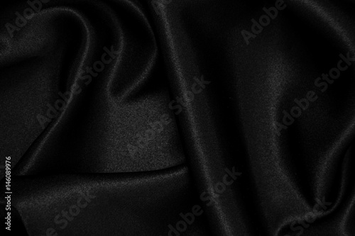 Black silk fabric background © treerasak