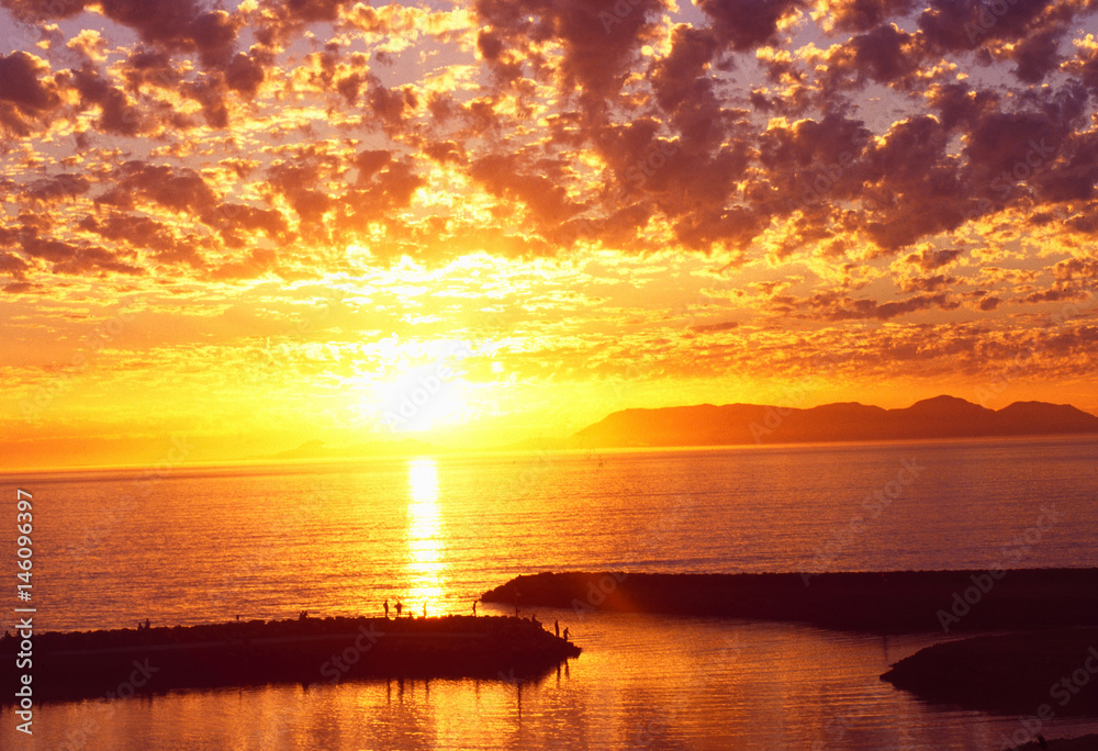 Südafrika: Sonnenuntergang über dem Meer bei Gordons Bay