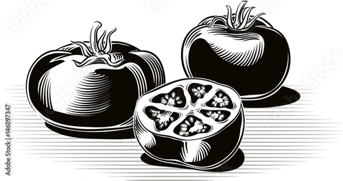 ripe tomatoes resting on a plane.