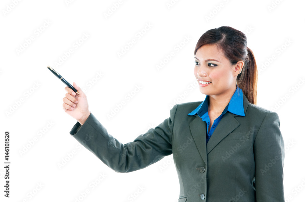 Businesswoman pointing with pen over white background Businesswoman pointing with pen over white background